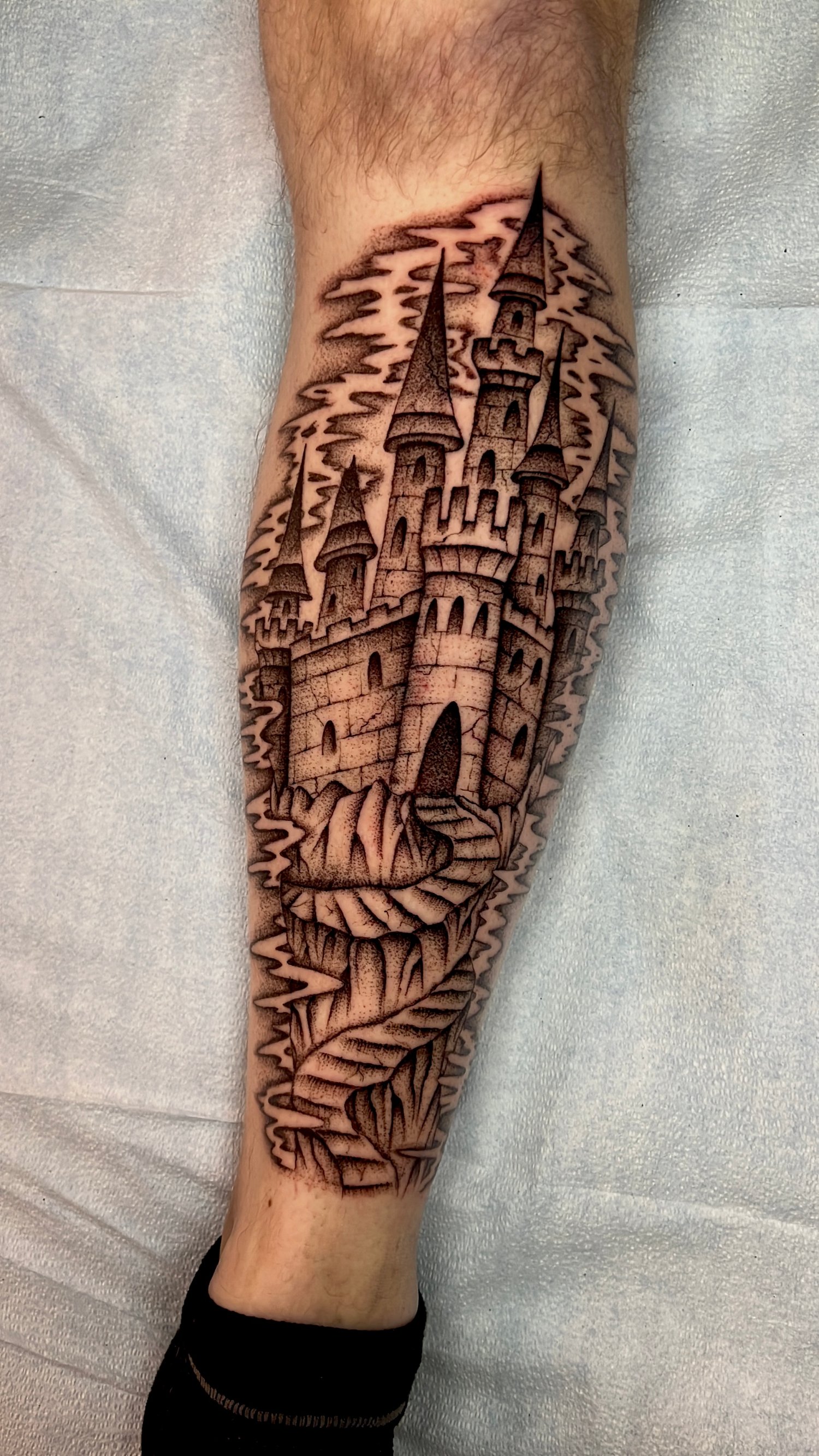 Fineline black and grey stippled tattoo of a castle, Portland, Oregon