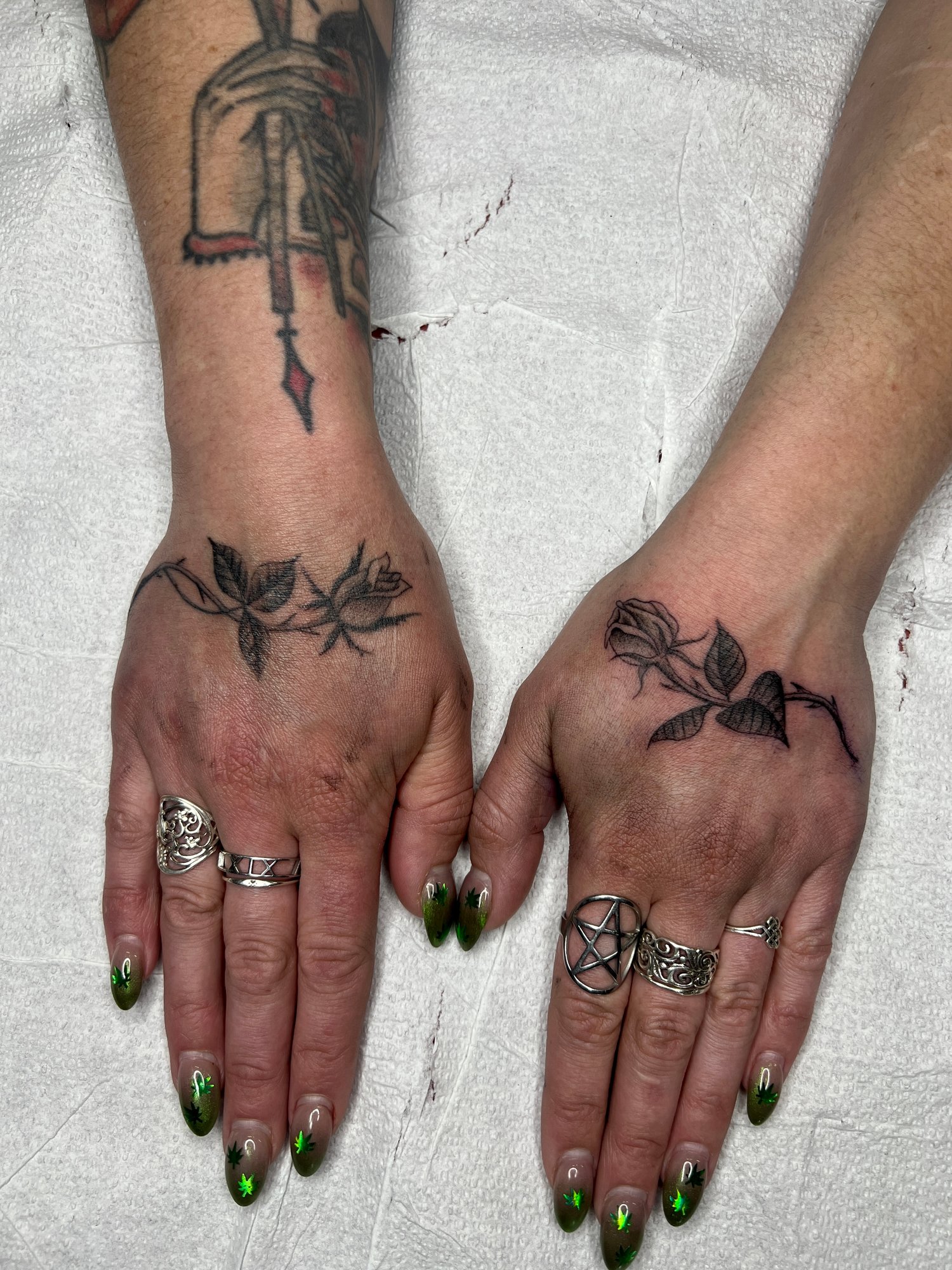 Fineline black and grey stippled tattoo of a hand roses, Portland, Oregon-1